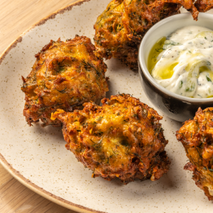 Crispy zucchini balls with tzatziki dip