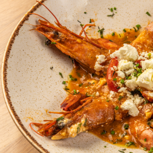 Shrimp “saganaki” with feta cheese, fresh tomato and oregano