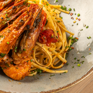 With shrimp, roasted cherry tomatoes, garlic and basil leaves