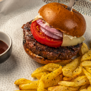 Burger with brioche bun, Black Angus minced meat, caper mayonnaise and French fries