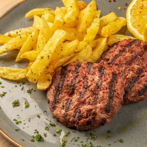 Grilled beef burgers with French fries