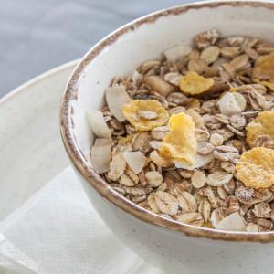 Cereal selection (grains or muesli or bran flakes) with milk and honey