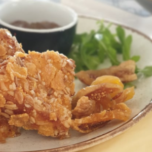 Breaded “Mastelo” cheese from Chios with cereals and fig marmalade