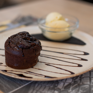 Chocolate lava cake with caramel and vanilla ice cream