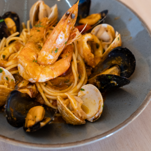 Seafood with shrimp, calamari, mussels, cockles and fresh tomato sauce