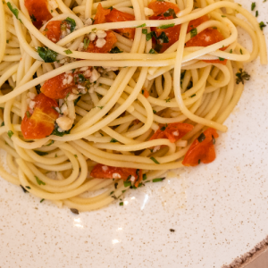Aglio olio with garlic, chopped tomato, parsley and extra virgin olive oil