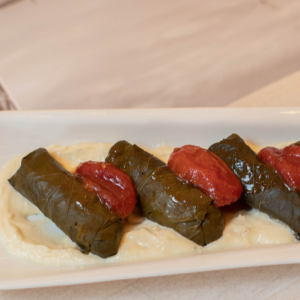 Dolmadakia with feta cream, cherry tomato relish and thyme
