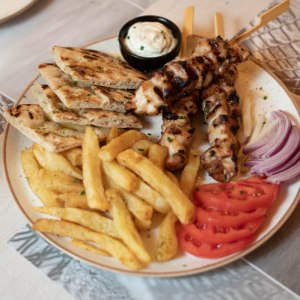 Juicy skewer with chicken thigh or pork neck marinated with herbs from our garden and French fries